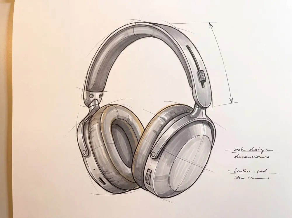 Sketch a marker di un paio di cuffie over-ear su carta da schizzo